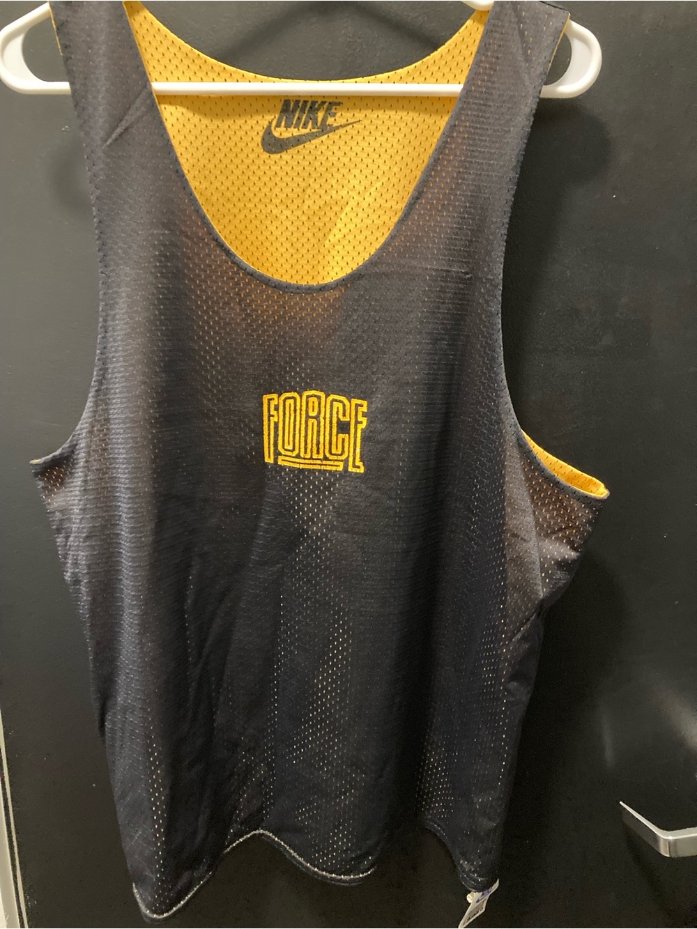 Nike Black & Gold 'Force' Mesh Jersey Tag Detail